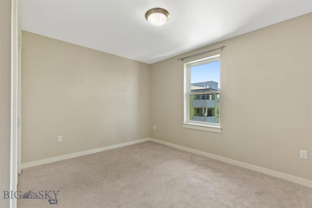 210 S Cottonwood Rd Unit 308, Bozeman, MT 59718 - carpeted spare room featuring baseboards