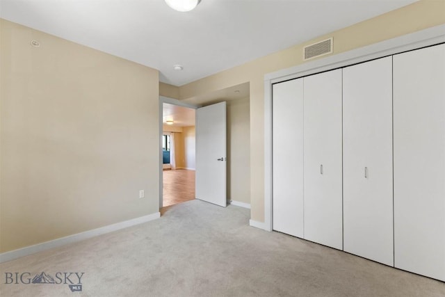 210 S Cottonwood Rd Unit 308, Bozeman, MT 59718 - unfurnished bedroom featuring carpet and a closet