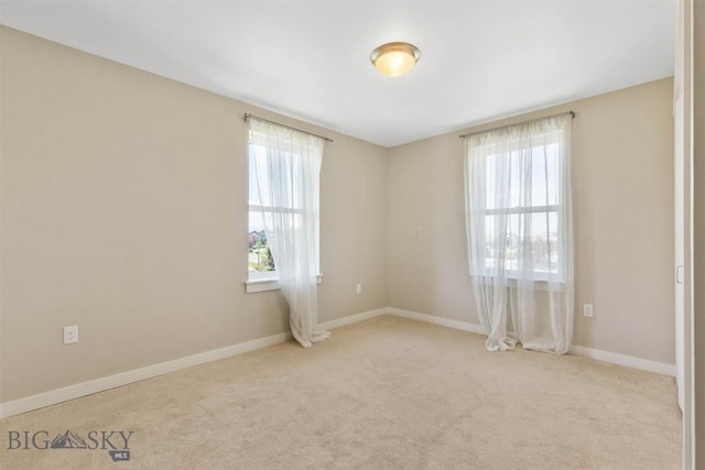 210 S Cottonwood Rd Unit 308, Bozeman, MT 59718 - carpeted empty room with plenty of natural light