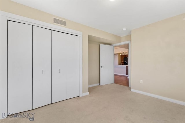210 S Cottonwood Rd Unit 308, Bozeman, MT 59718 - unfurnished bedroom featuring carpet floors and a closet
