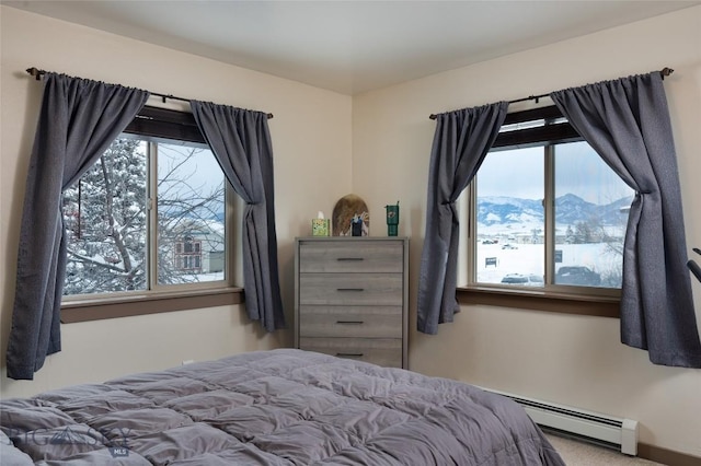 1132 Cruiser Ln Unit F, Belgrade, MT 59714 - bedroom featuring baseboard heating and carpet flooring