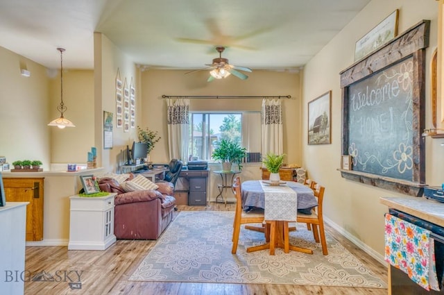 215 N 4th St Unit B, Manhattan, MT 59741 - dining area with a ceiling fan and wood finished floors