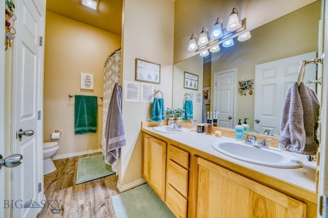 215 N 4th St Unit B, Manhattan, MT 59741 - full bathroom with double vanity and wood finished floors