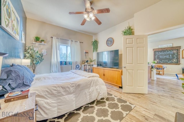 215 N 4th St Unit B, Manhattan, MT 59741 - bedroom with light wood finished floors, vaulted ceiling, and a ceiling fan