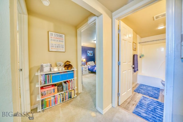 215 N 4th St Unit B, Manhattan, MT 59741 - corridor with carpet and baseboards