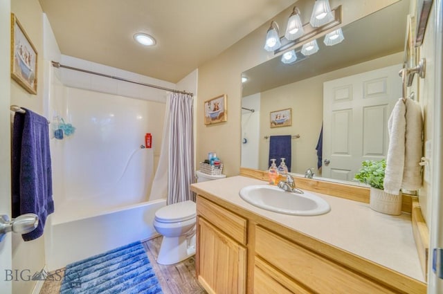 215 N 4th St Unit B, Manhattan, MT 59741 - bathroom with vanity, shower / tub combo, and wood finished floors