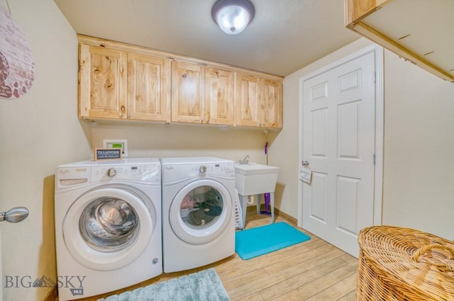 215 N 4th St Unit B, Manhattan, MT 59741 - laundry area featuring washer and clothes dryer, cabinet space, and wood finished floors
