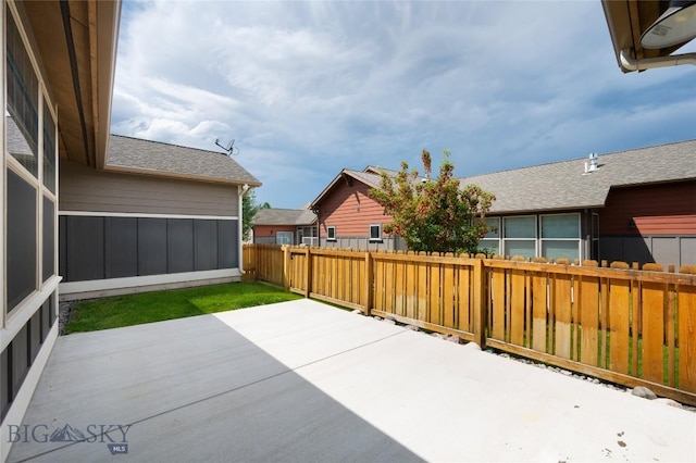 5479 Annie St, Bozeman, MT 59718 - fenced backyard featuring a patio area