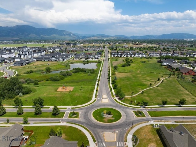 5479 Annie St, Bozeman, MT 59718 - aerial view of property and surrounding area featuring nearby suburban area and a water and mountain view