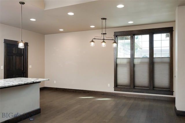 5479 Annie St, Bozeman, MT 59718 - unfurnished dining area featuring dark wood-style floors and recessed lighting