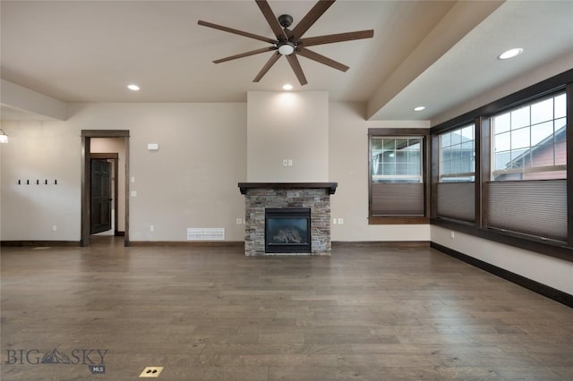 5479 Annie St, Bozeman, MT 59718 - unfurnished living room with a ceiling fan, wood finished floors, recessed lighting, and a fireplace