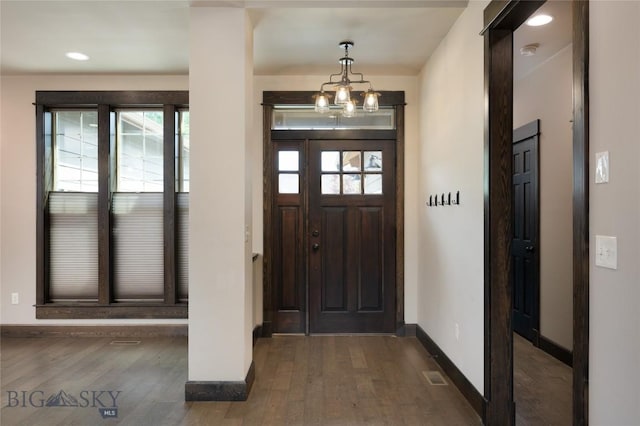5479 Annie St, Bozeman, MT 59718 - foyer featuring dark wood-style floors, a chandelier, and recessed lighting