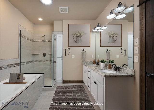 5479 Annie St, Bozeman, MT 59718 - bathroom with a garden tub, a stall shower, and double vanity
