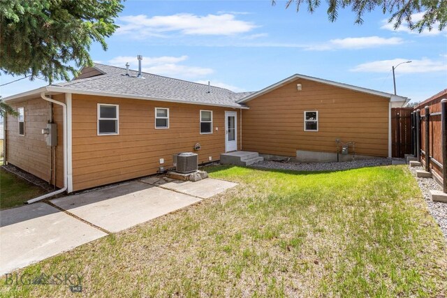 735 10th St, Butte, MT 59701 - rear view of house featuring a patio area and roof with shingles