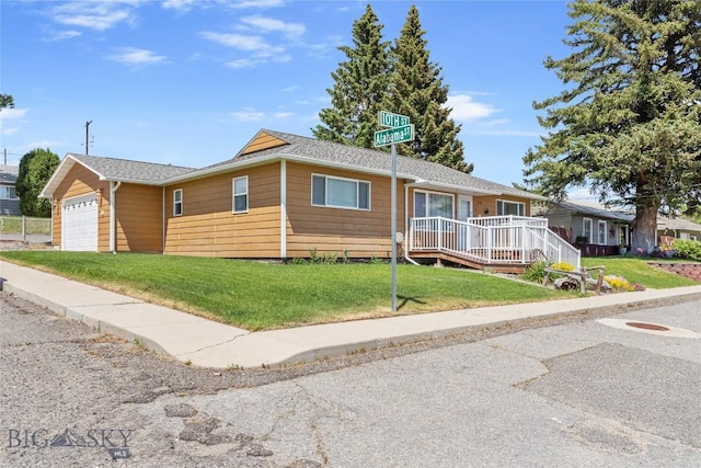 735 10th St, Butte, MT 59701 - ranch-style home featuring a front yard and a garage