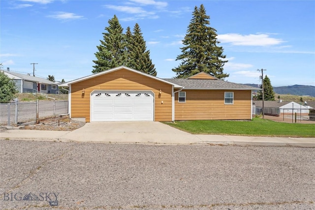 735 10th St, Butte, MT 59701 - view of front of house with driveway and a garage