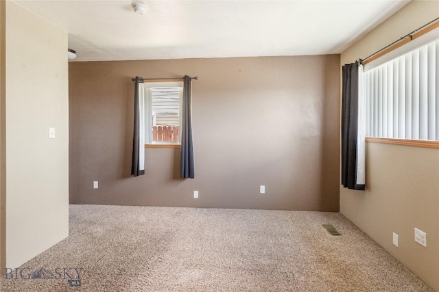 735 10th St, Butte, MT 59701 - empty room featuring carpet flooring and a smoke detector