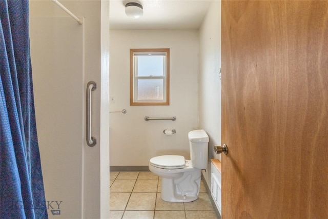 735 10th St, Butte, MT 59701 - full bathroom with tile patterned floors and a shower