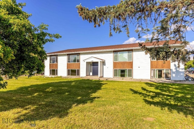 1714 S 19th Ave, Bozeman, MT 59718 - rear view of house with a lawn
