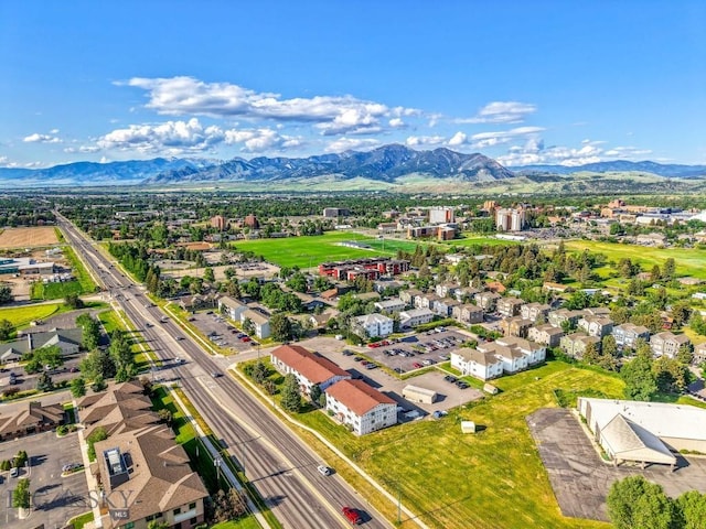 1714 S 19th Ave, Bozeman, MT 59718 - aerial perspective of suburban area with a mountainous background and a main thoroughfare