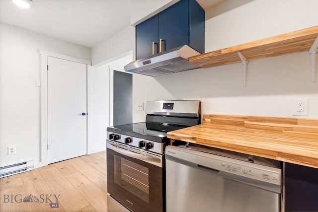 1714 S 19th Ave, Bozeman, MT 59718 - kitchen featuring stainless steel appliances, range hood, blue cabinets, light wood-style floors, and wooden counters