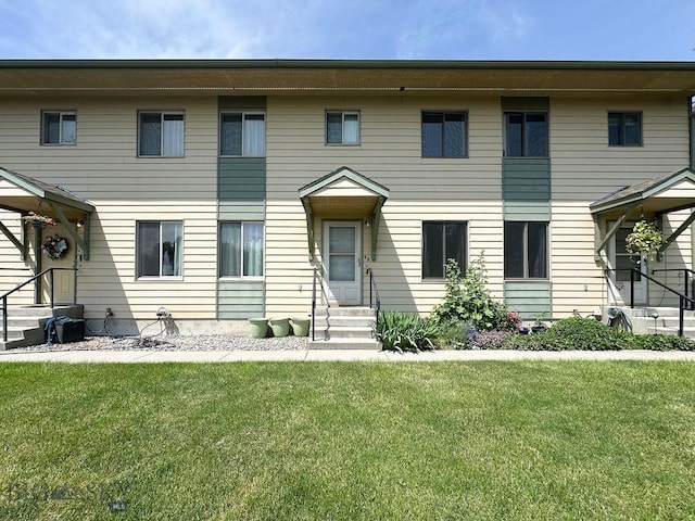 45 Chestnut Grove Ave, Bozeman, MT 59718 - view of front of home with entry steps and a front yard