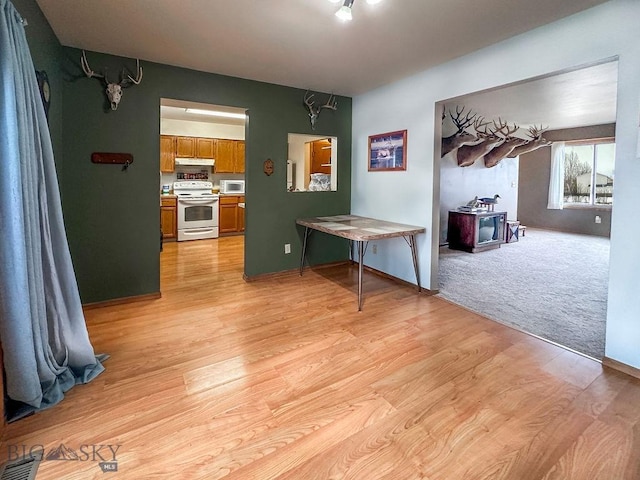 45 Chestnut Grove Ave, Bozeman, MT 59718 - dining space with light wood-style floors and baseboards