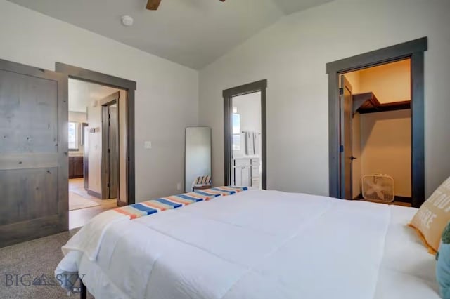 421 Otis Ave, Ennis, MT 59729 - bedroom with connected bathroom, vaulted ceiling, and ceiling fan