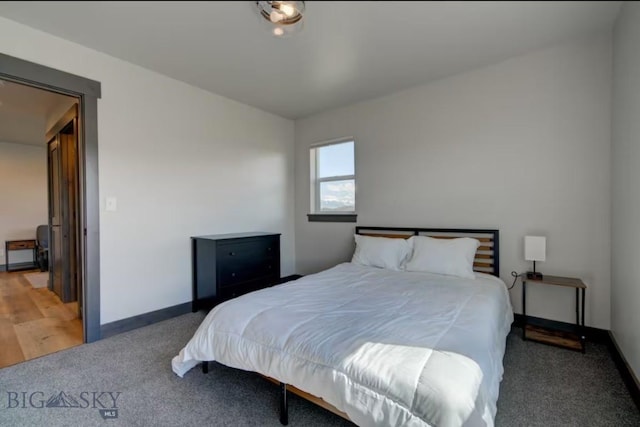 421 Otis Ave, Ennis, MT 59729 - bedroom featuring light carpet and baseboards
