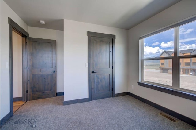 421 Otis Ave, Ennis, MT 59729 - unfurnished bedroom with carpet and baseboards