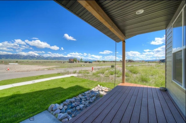 421 Otis Ave, Ennis, MT 59729 - deck featuring a lawn and a rural view