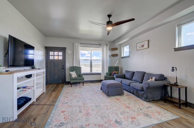 421 Otis Ave, Ennis, MT 59729 - living area featuring ceiling fan and wood finished floors