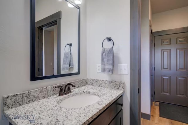 421 Otis Ave, Ennis, MT 59729 - bathroom with vanity and wood finished floors