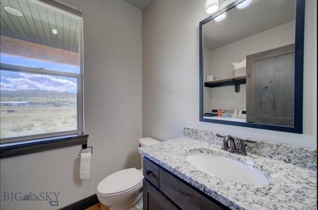 421 Otis Ave, Ennis, MT 59729 - half bath featuring vanity and toilet