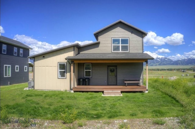 421 Otis Ave, Ennis, MT 59729 - view of front of home featuring covered porch and a front lawn