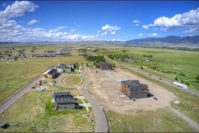 421 Otis Ave, Ennis, MT 59729 - aerial view of property and surrounding area featuring mountains and rural landscape