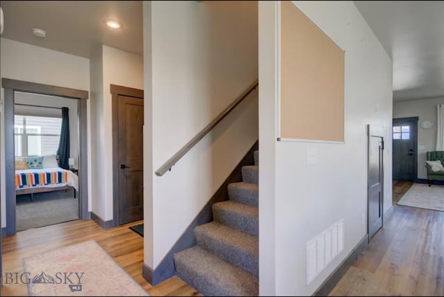 421 Otis Ave, Ennis, MT 59729 - stairway with wood finished floors and recessed lighting