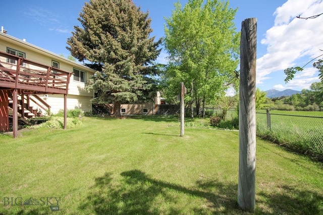 1716 S Rouse, Bozeman, MT 59715 - view of yard with a deck with mountain view and stairs