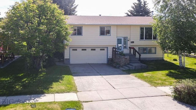 1716 S Rouse, Bozeman, MT 59715 - bi-level home with a garage, a front lawn, and concrete driveway