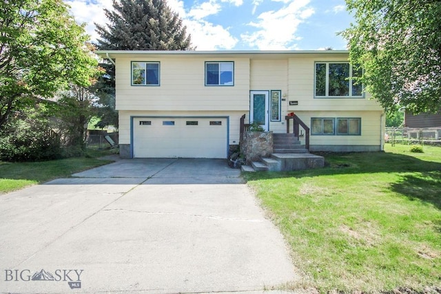 1716 S Rouse, Bozeman, MT 59715 - split foyer home featuring a garage and concrete driveway