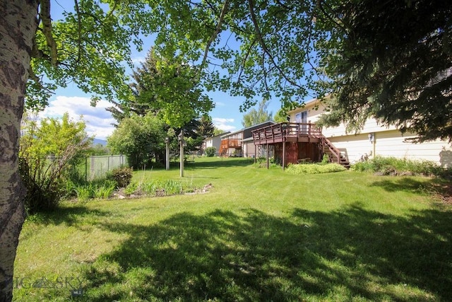 1716 S Rouse, Bozeman, MT 59715 - view of yard featuring stairs and a deck