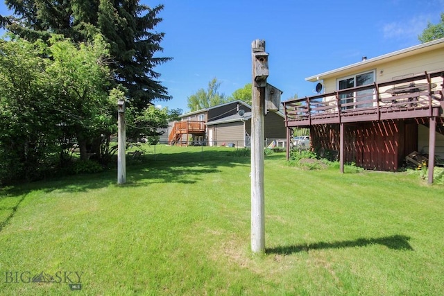 1716 S Rouse, Bozeman, MT 59715 - view of green lawn with a wooden deck