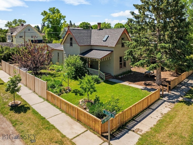 606 S Washington St, Dillon, MT 59725 - view of front of property featuring a shingled roof and a porch