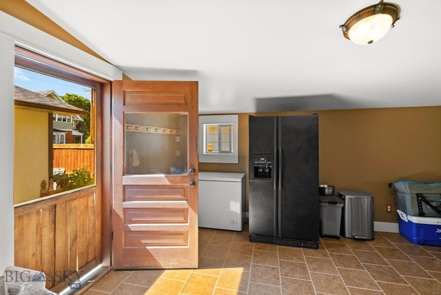 606 S Washington St, Dillon, MT 59725 - kitchen featuring black fridge and fridge