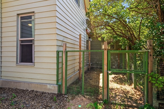 606 S Washington St, Dillon, MT 59725 - view of home's exterior featuring a gate