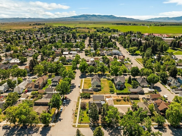606 S Washington St, Dillon, MT 59725 - aerial view of residential area featuring a mountainous background