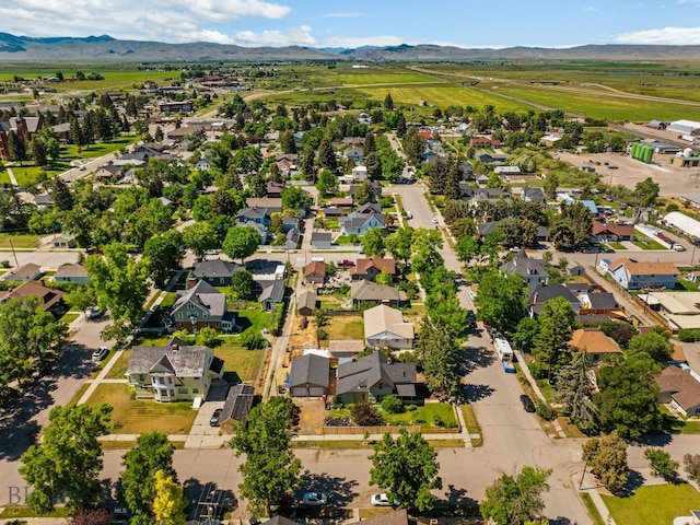 606 S Washington St, Dillon, MT 59725 - aerial view of residential area with a mountain backdrop