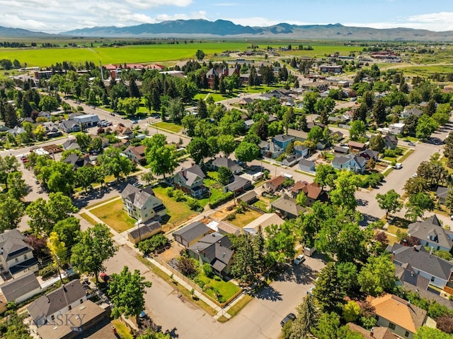 606 S Washington St, Dillon, MT 59725 - aerial perspective of suburban area featuring a mountain backdrop