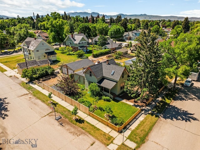 606 S Washington St, Dillon, MT 59725 - aerial view of residential area with a mountainous background