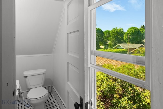 606 S Washington St, Dillon, MT 59725 - bathroom with toilet and tile patterned flooring